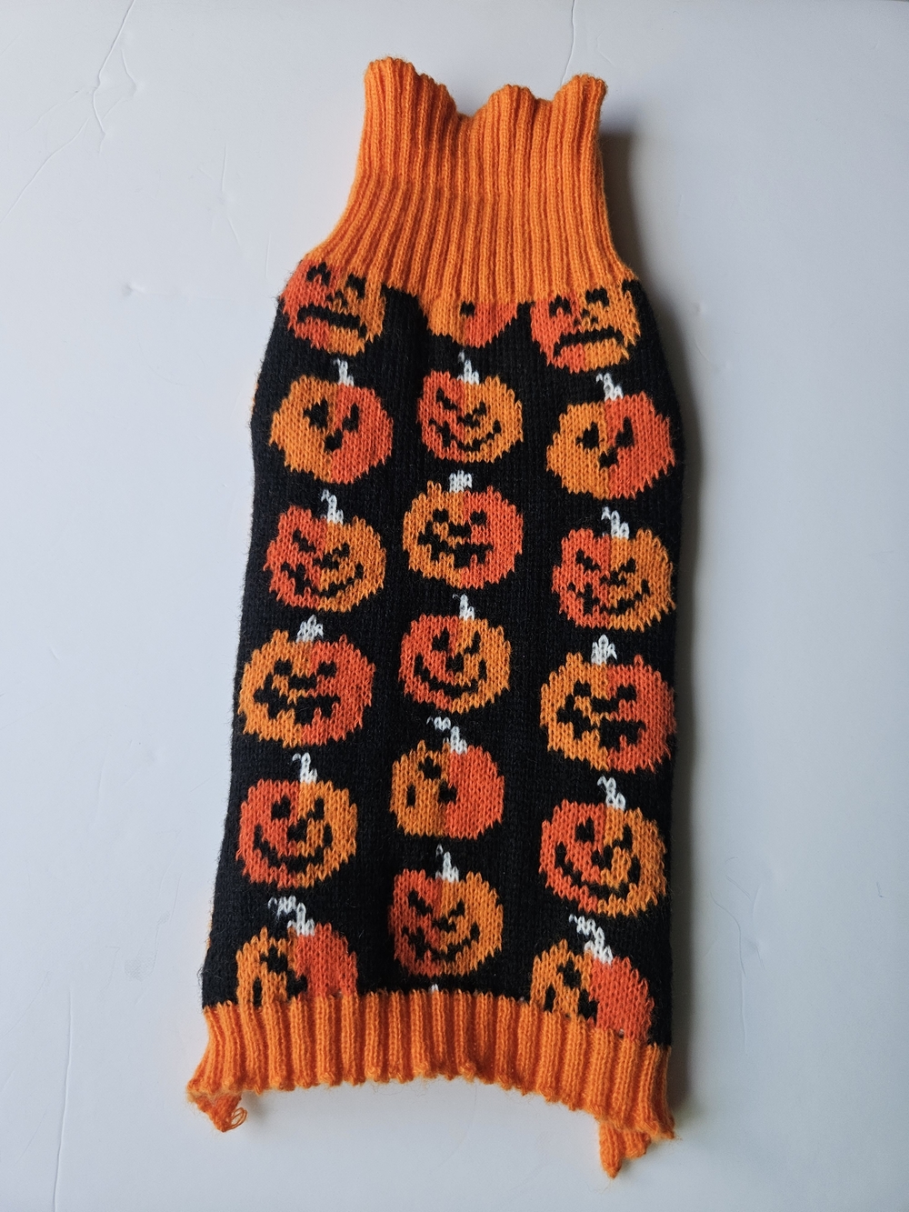 the Hyde & EEK! Boutique Stacked Pumpkins Halloween Dog Sweater. It is a festive